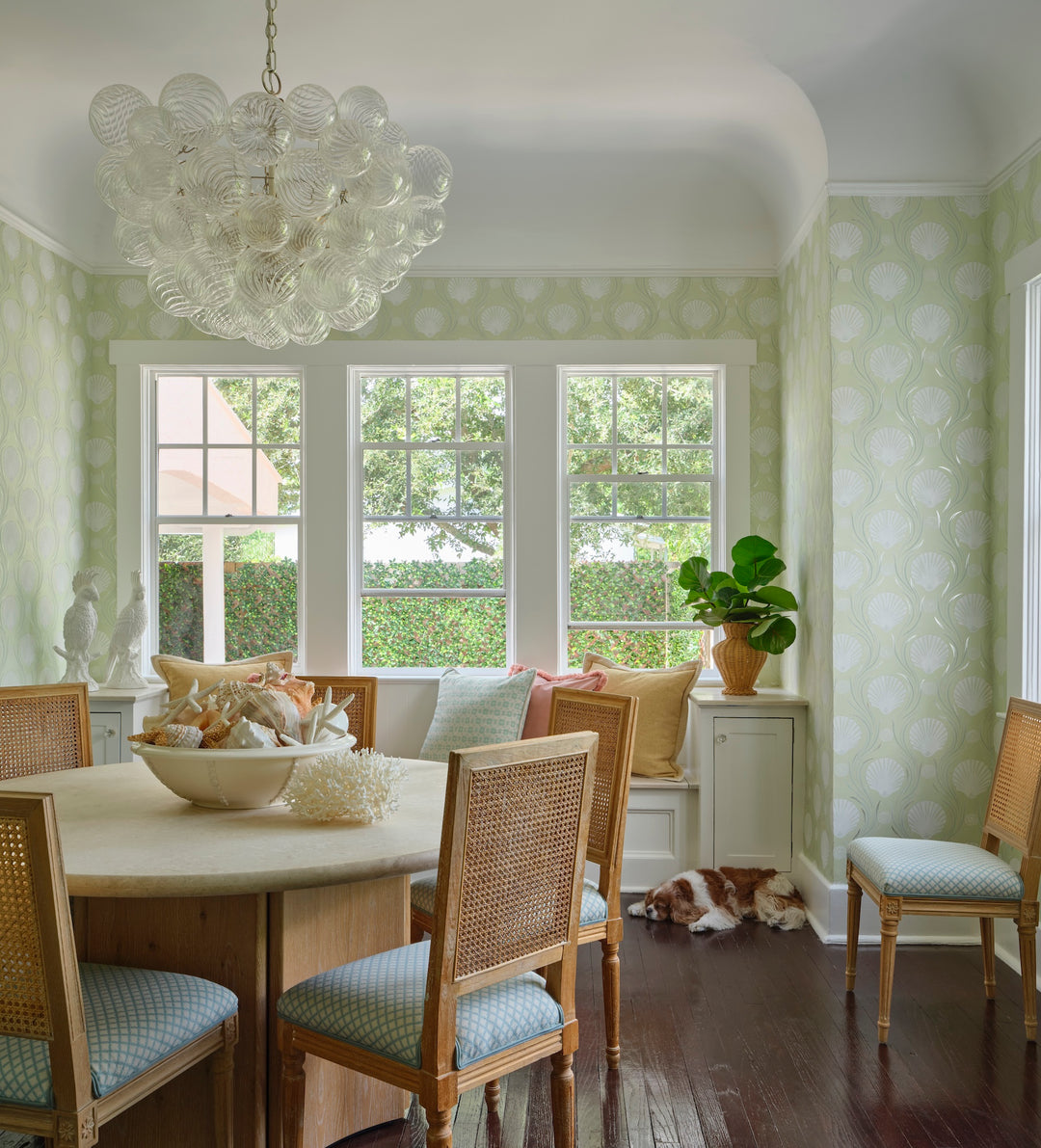 Dining room with seashell wallpaper