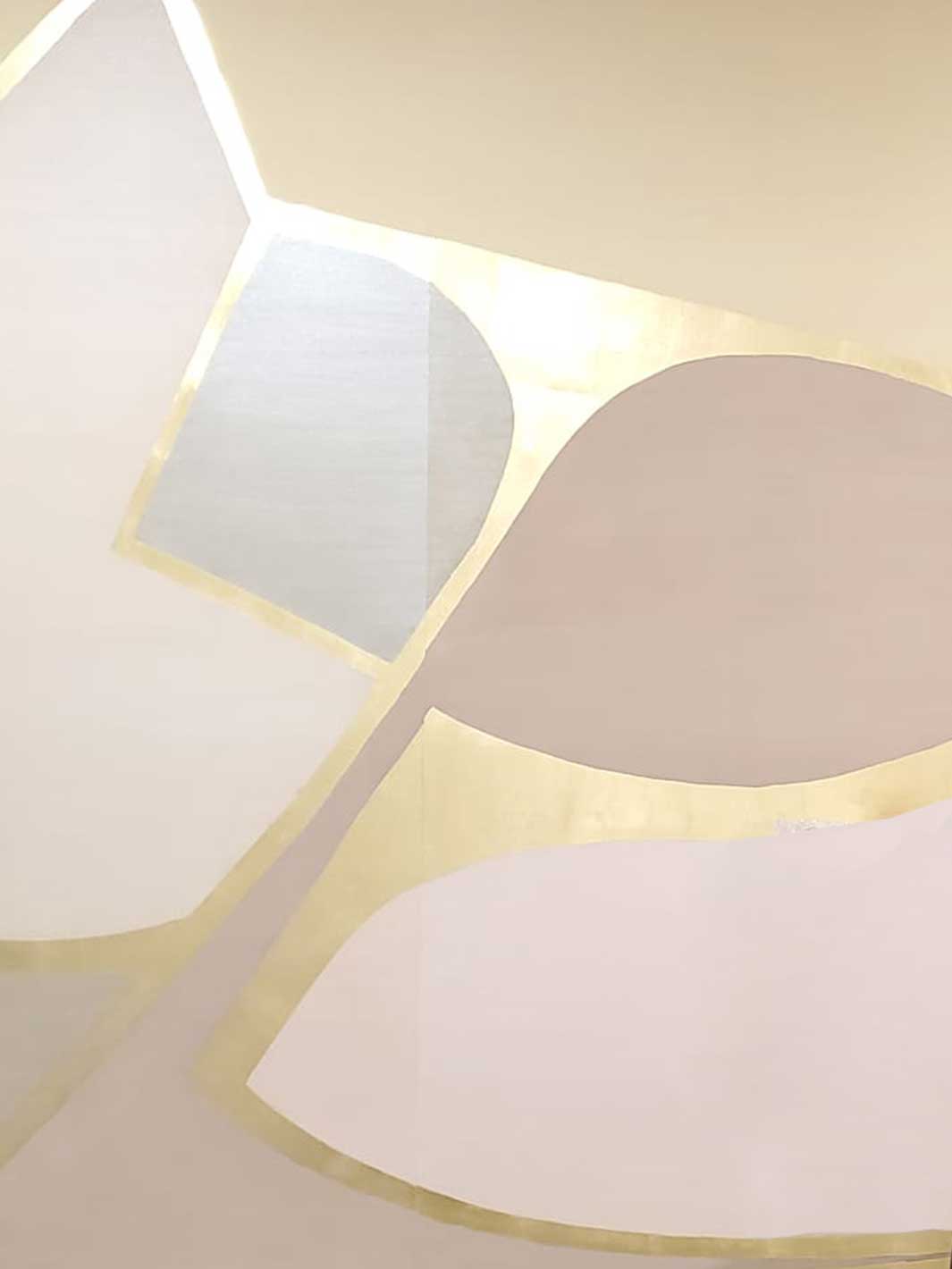 Aqualille Geo wallpaper in warm gold